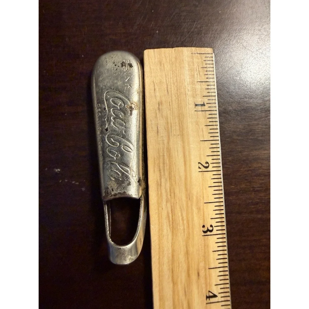 Vintage 1930's Coca Cola Metal Bottle Opener Consolidated Cork Corp Collectible